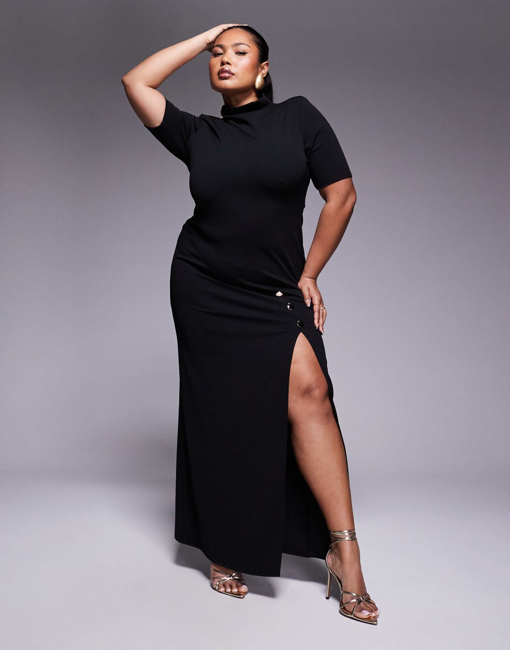 asos design curve high neck maxi pencil dress with short sleeves and large gold button detail slit in black