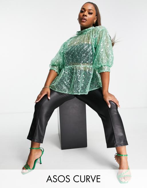 Plus Sequin Long Sleeved Peplum Top