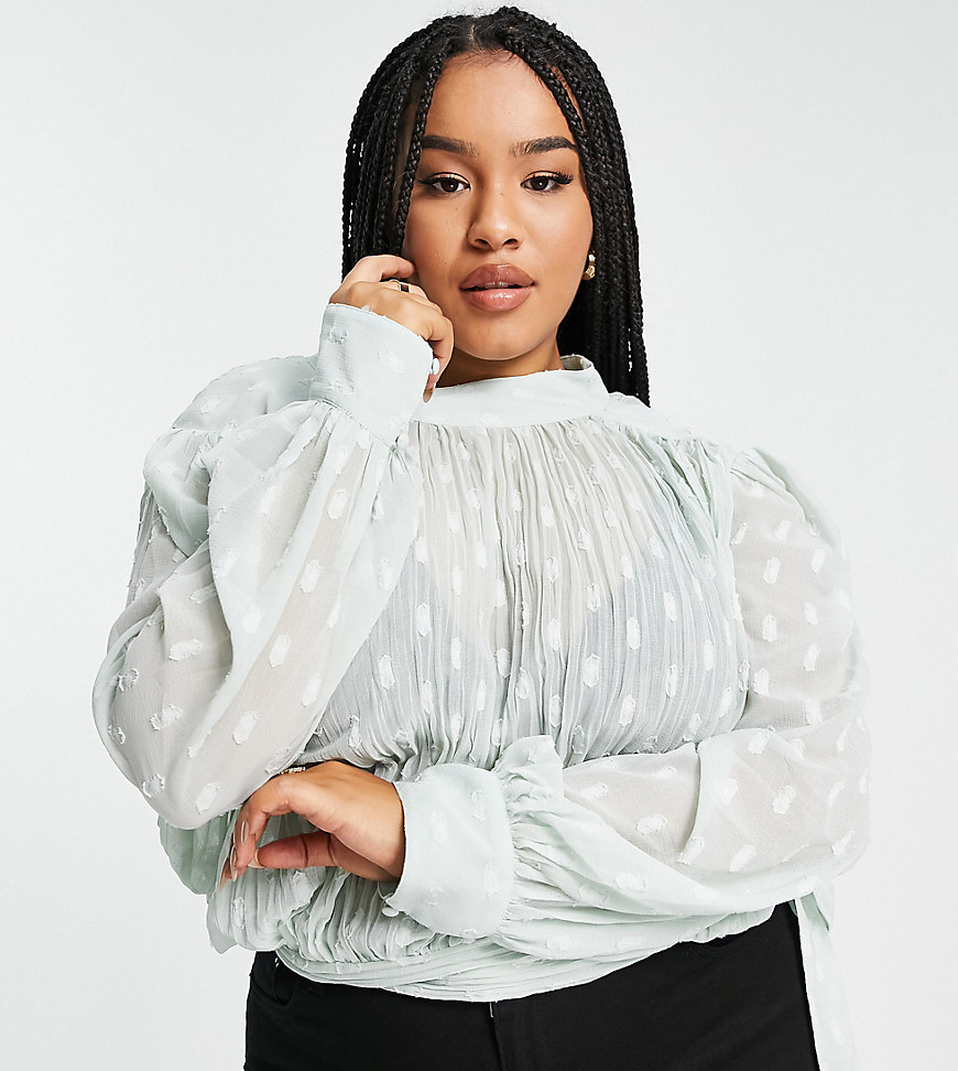 Plus-size top by ASOS DESIGN Introduce it to your other nice tops Jacquard spot pattern High neck Button cuffs Tie hem and back Relaxed fit
