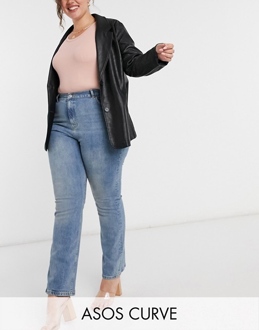 ASOS DESIGN Curve high rise '70's' kick flare jeans in mid vintage wash ...