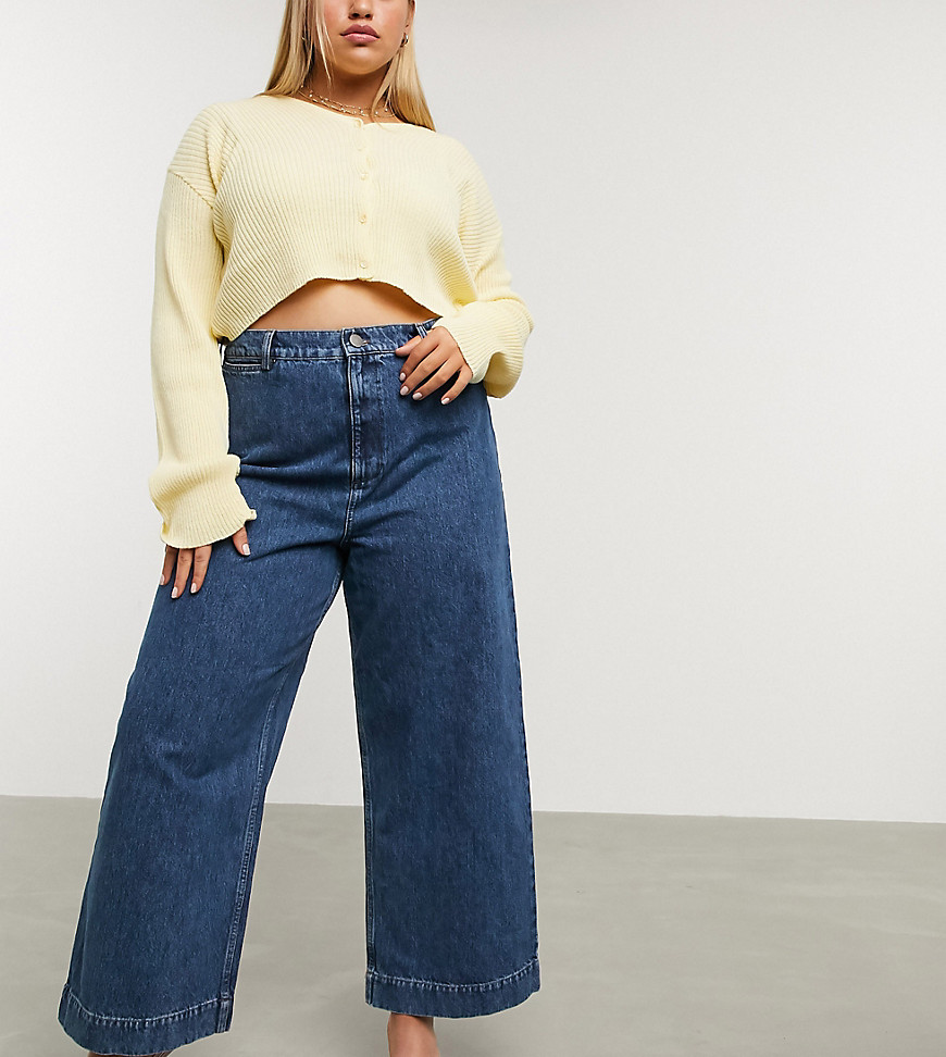 ASOS DESIGN Curve High rise 'easy' wide leg jeans in mid wash blue