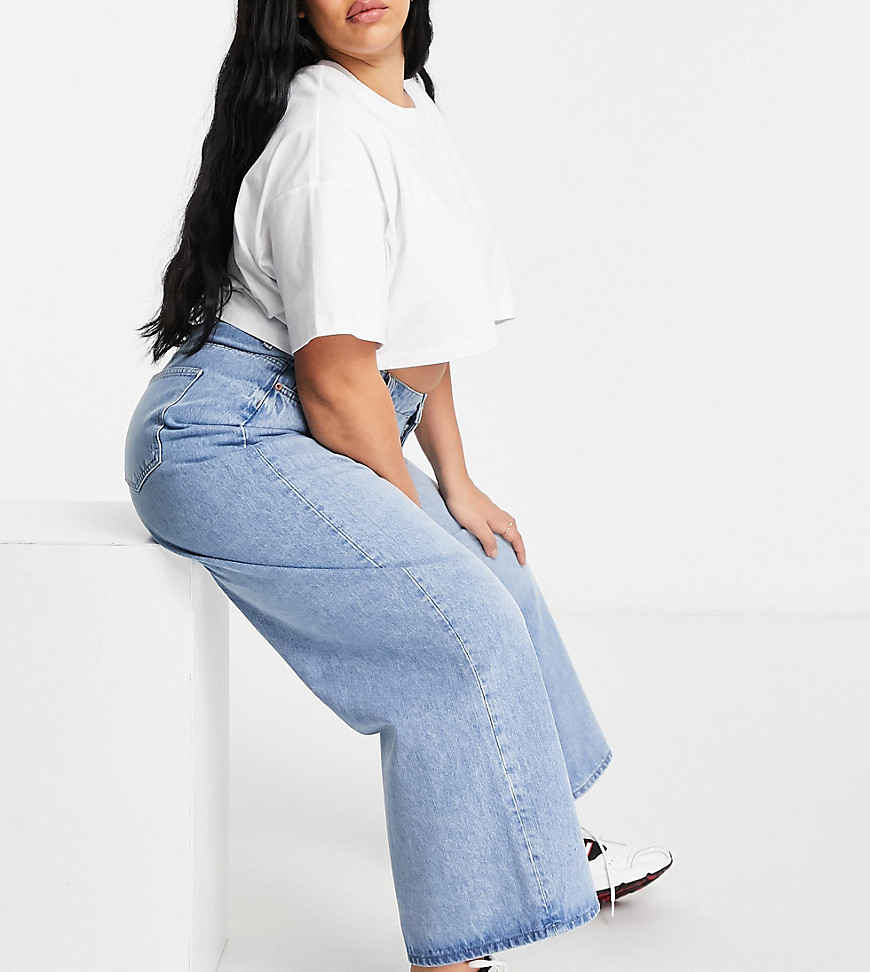 Plus-size jeans by ASOS DESIGN High rise Belt loops Five pockets Relaxed tapered fit Cut loosely around the thigh with a narrow shape through the leg