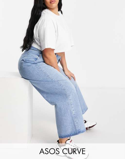 ASOS DESIGN Curve high rise 'relaxed' dad jeans in midwash |