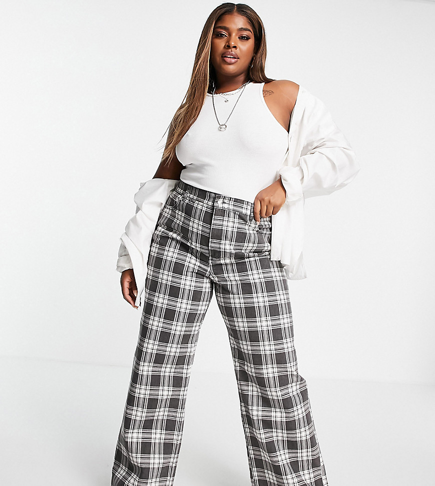 Plus-size jeans by ASOS DESIGN The scroll is over Check design High rise Stretch-back waist Five pockets Relaxed dad fit
