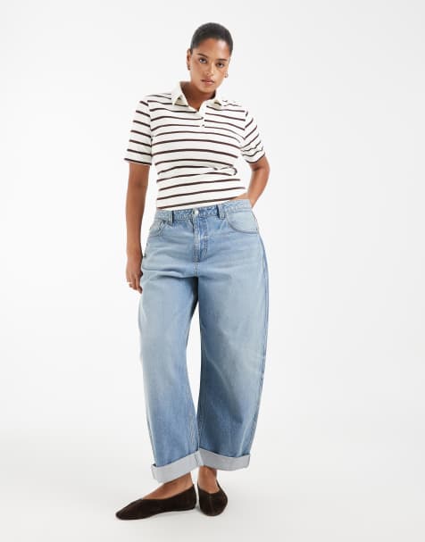 ASOS DESIGN Curve high rise relaxed roll up jeans in midwash blue - view 1