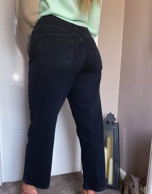 black stretch straight leg jeans