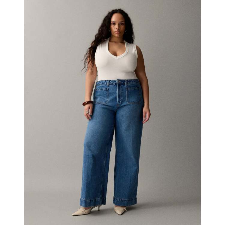 ASOS DESIGN Curve high rise wide leg jeans with front pockets in
