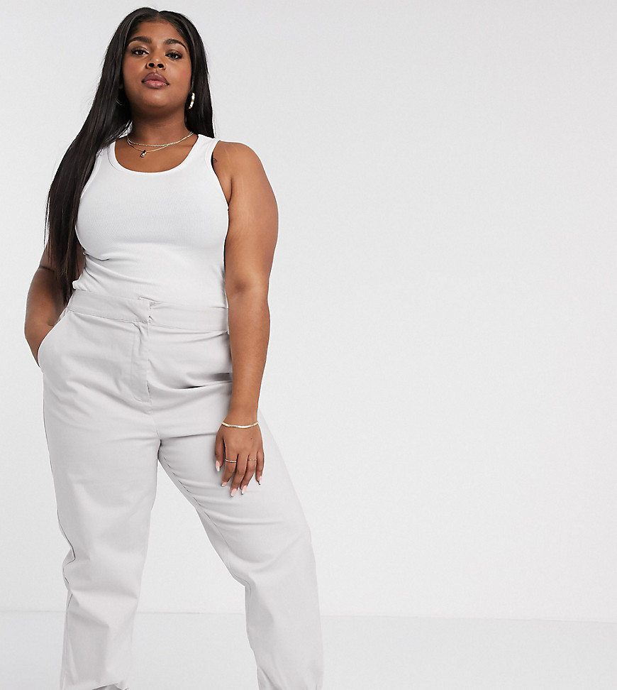 Plus-size sweatpants by ASOS DESIGN Part of our responsible edit High rise Concealed fly Stretch waist and cuffs Belt loops Functional pockets Regular fit Just select your usual size