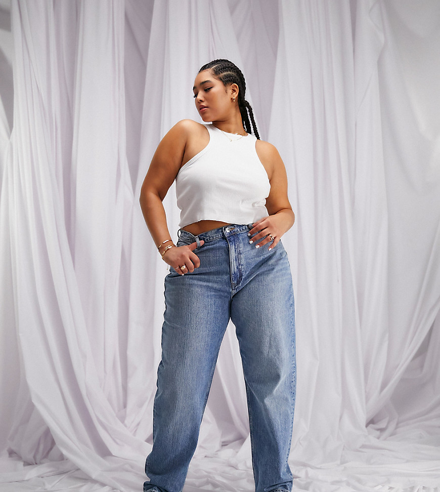 Plus-size jeans by ASOS DESIGN Wear wash repeat High rise Belt loops Five pockets Relaxed mom fit