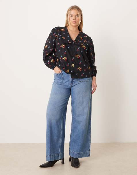 ASOS DESIGN Curve high waist wide leg jeans with front pockets in mid blue - view 1