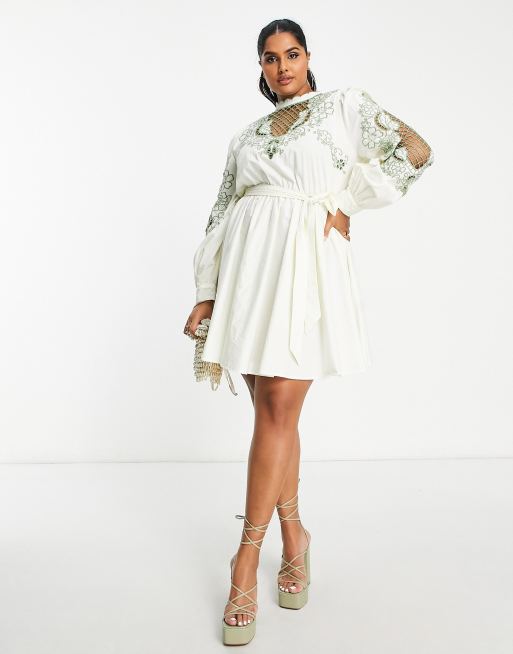 ASOS DESIGN Curve - Hoogsluitende mini-jurk met opengewerkte groen details en strikceintuur in stone