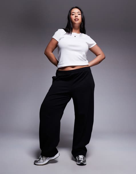 ASOS DESIGN Curve interlock barrel leg trackies in black - view 1