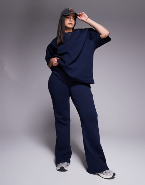 ASOS DESIGN Curve interlock flared sweatpants in navy - part of a set - view 1
