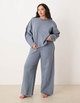 ASOS Curve ASOS DESIGN Curve interlock super wide leg jogger with seam detail in blue