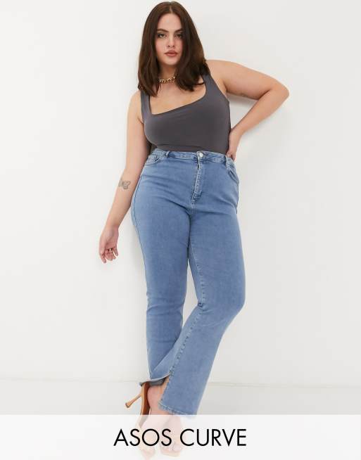 ASOS DESIGN Curve - Jaren '90' flare met stretch en hoge taille in heldere wassing