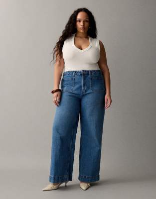 ASOS DESIGN Curve - Jean large à taille haute avec poches à l'avant - Bleu moyen 26 L34