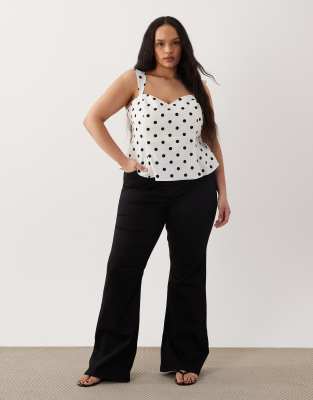 ASOS DESIGN Curve - Jean sculptant évasé en tissu power stretch - Noir 28 L30