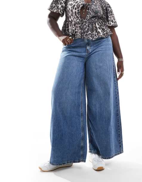 ASOS DESIGN Curve - Jeans met wijde pijpen in middenblauw - view 1