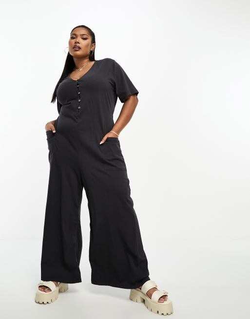 ASOS DESIGN Curve jersey button front chuck on jumpsuit in washed black