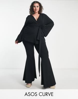 ASOS DESIGN Curve jersey extreme super flare suit pants in black