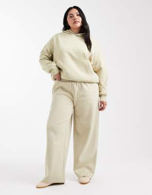 ASOS DESIGN Curve - Jogginghose mit in Olivgrün mit weicher Innenseite und weitem Bein