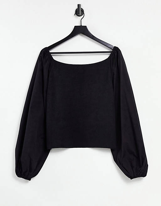 Women Curve jumper with plunge neck and woven sleeves in black 