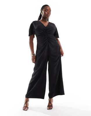 ASOS DESIGN Curve - Jumpsuit in Schwarz mit geraffter Vorderseite und Cut-Out auf der Rückseite