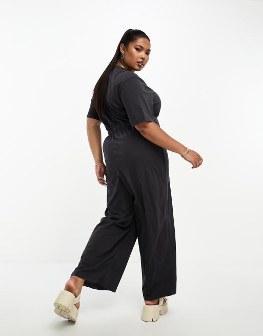 ASOS DESIGN Curve Jumpsuit zum Reinschlupfen aus Jersey in verwaschenem Schwarz mit Knopfleiste ASOS