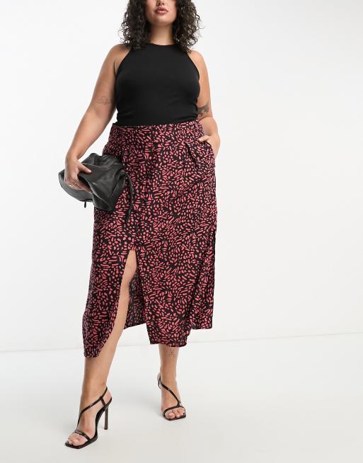 ASOS DESIGN Curve - Jupe mi-longue boutonnée et fendue avec imprimé abstrait orange 