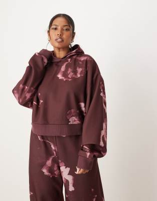 ASOS DESIGN Curve - Kapuzenpullover in Pflaume mit All-over-Blumenmuster, Kombiteil-Lila