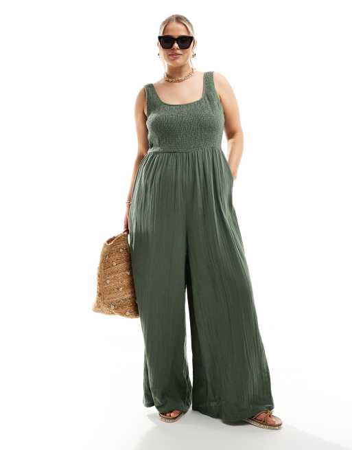 ASOS DESIGN Curve – Khakifärgad jumpsuit med vida ben och djup halsringning