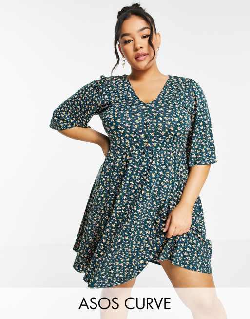 ASOS DESIGN Curve - Kleine swingjurk met bloemenprint in donkergroen