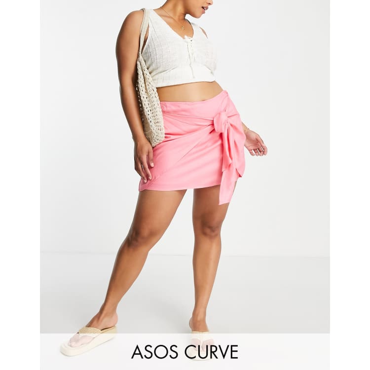 ASOS DESIGN Curve knot wrap mini skirt in hot pink ASOS