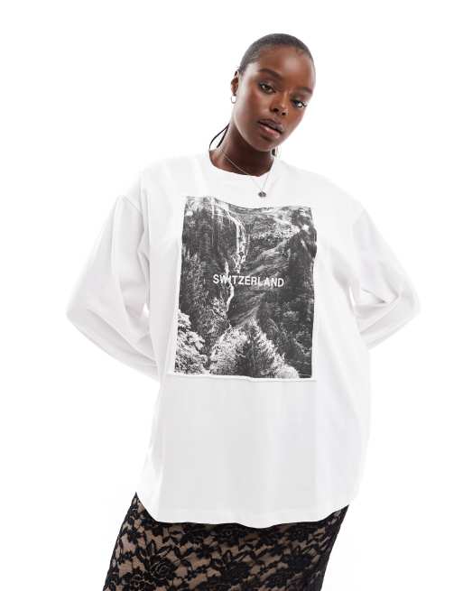 ASOS DESIGN Curve – Kremowy top typu skater z długimi rękawami i naszytą grafiką z motywem Szwajcarii