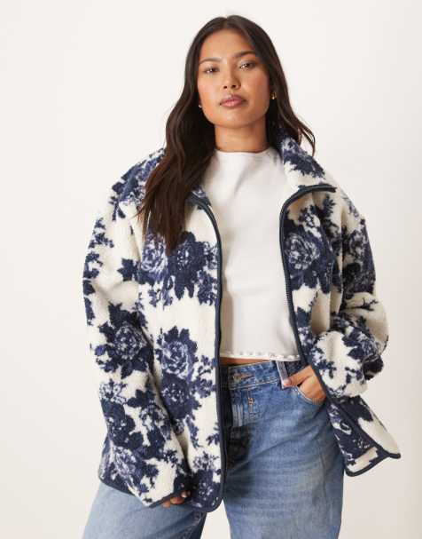 ASOS DESIGN Curve zip through borg fleece in navy and cream floral design