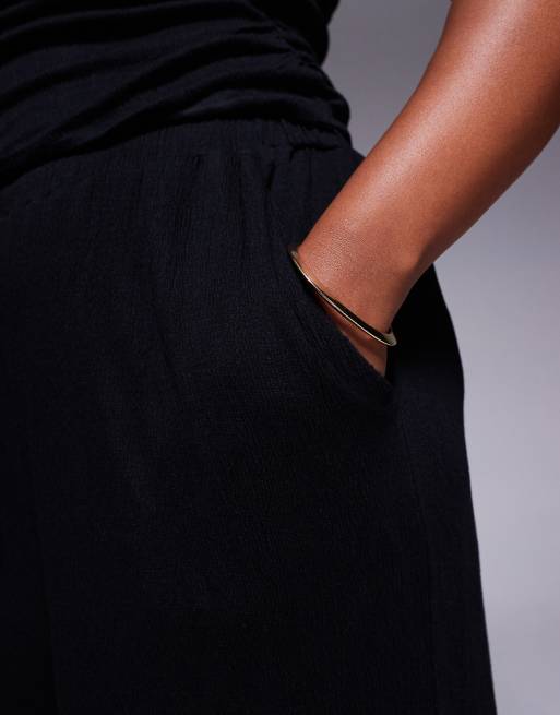 ASOS DESIGN Curve – Krinklade byxor med vida ben och knytmidja, 3 av 5