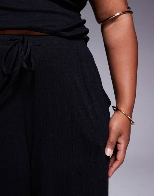 ASOS DESIGN Curve – Krinklade byxor med vida ben och knytmidja, 5 av 5