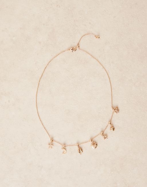 ASOS DESIGN Curve – Kurze Halskette in Goldoptik mit mehreren Anhängern, 2 von 3