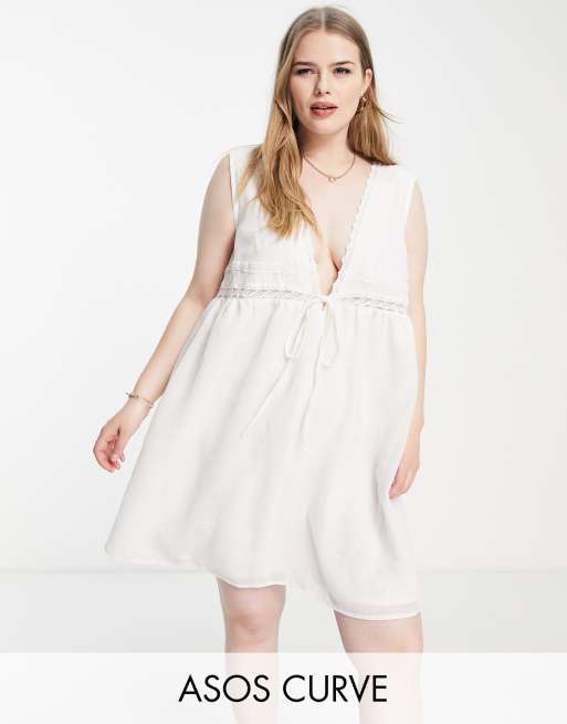 ASOS DESIGN Curve lace insert sleeveless embroidered mini sundress with tie detail in white ASOS