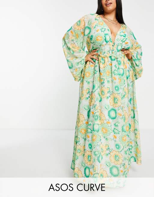 ASOS DESIGN Curve - Lange jurk met zachte, gesmokte taille en open achterkant in groen met bloemenprint 