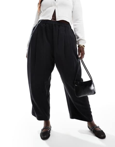 ASOS DESIGN Curve – Legere Schlupfhose aus hochwertigem Material in verwaschenem Schwarz mit Bundfalten - view 1