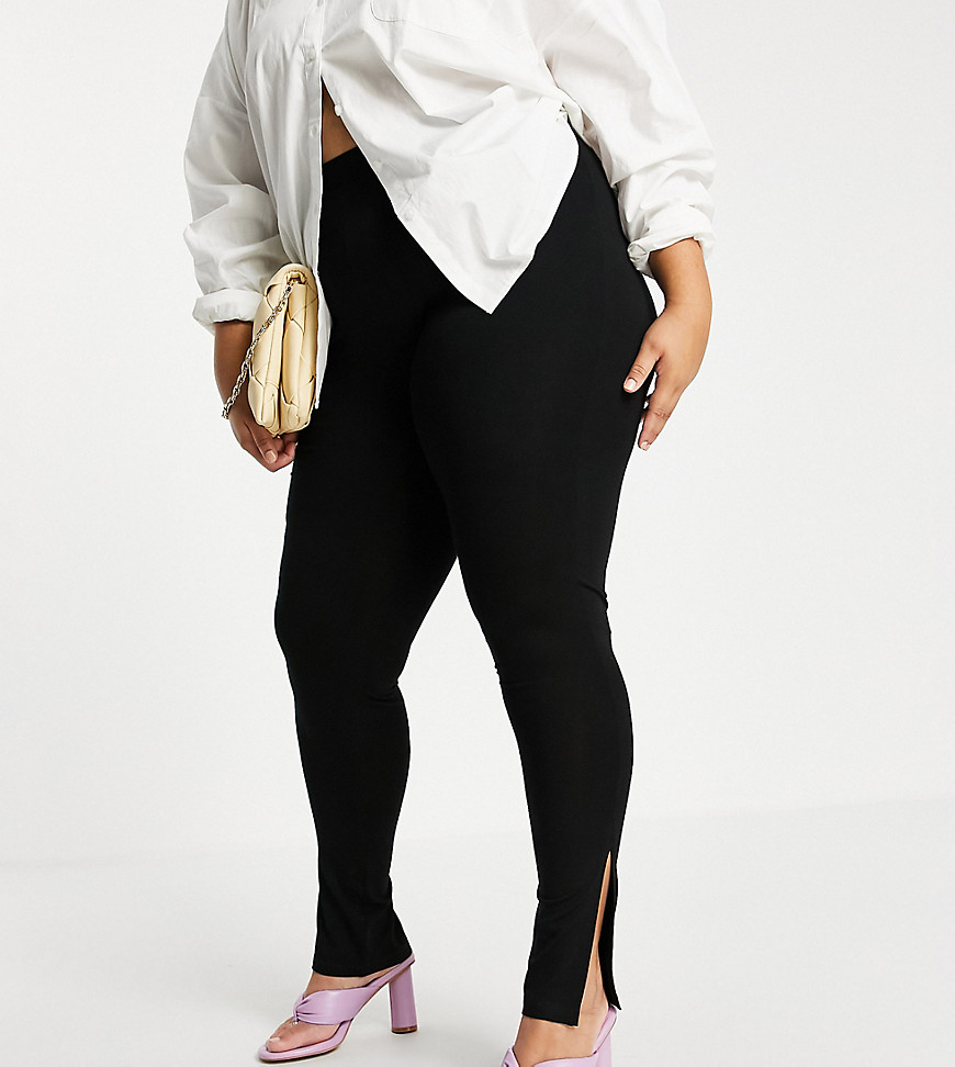 Plus-size leggings by ASOS DESIGN Add-to-bag material High rise Elasticated waist Side splits Bodycon fit