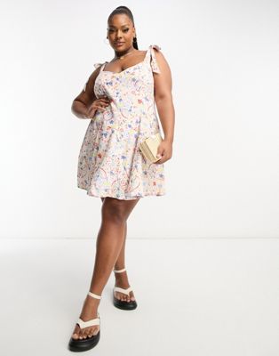 ASOS DESIGN Curve linen tie cross strap swing mini sundress with godets in ditsy floral-Multi