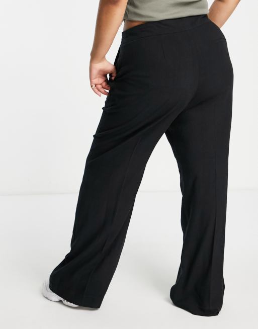 ASOS DESIGN Curve linen wide leg relaxed flare pants in black