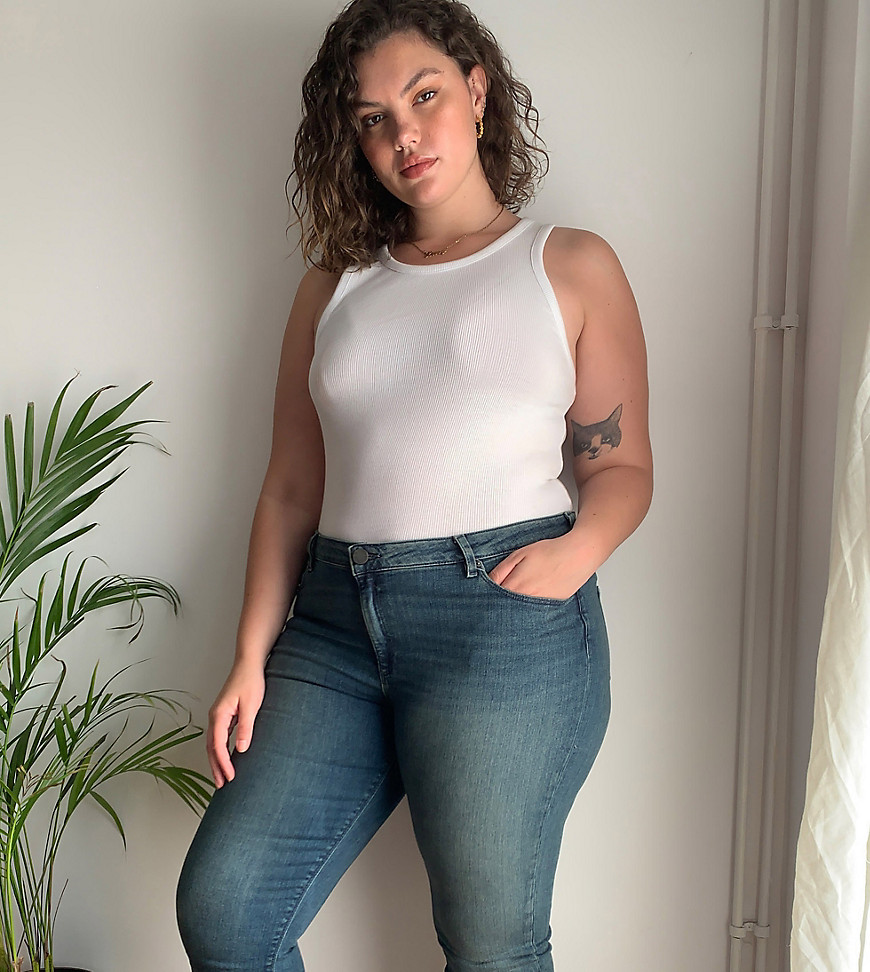 Plus-size jeans by ASOS DESIGN Worn and shot by one of our models at home Mid-rise waist Belt loops Zip fly Five pockets Skinny fit Tight cut, regular on the waist #AtHomeWithASOS