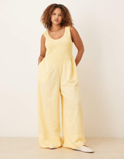 ASOS DESIGN Curve – Ljusgul, krinklad jumpsuit med djup halsringning - view 1