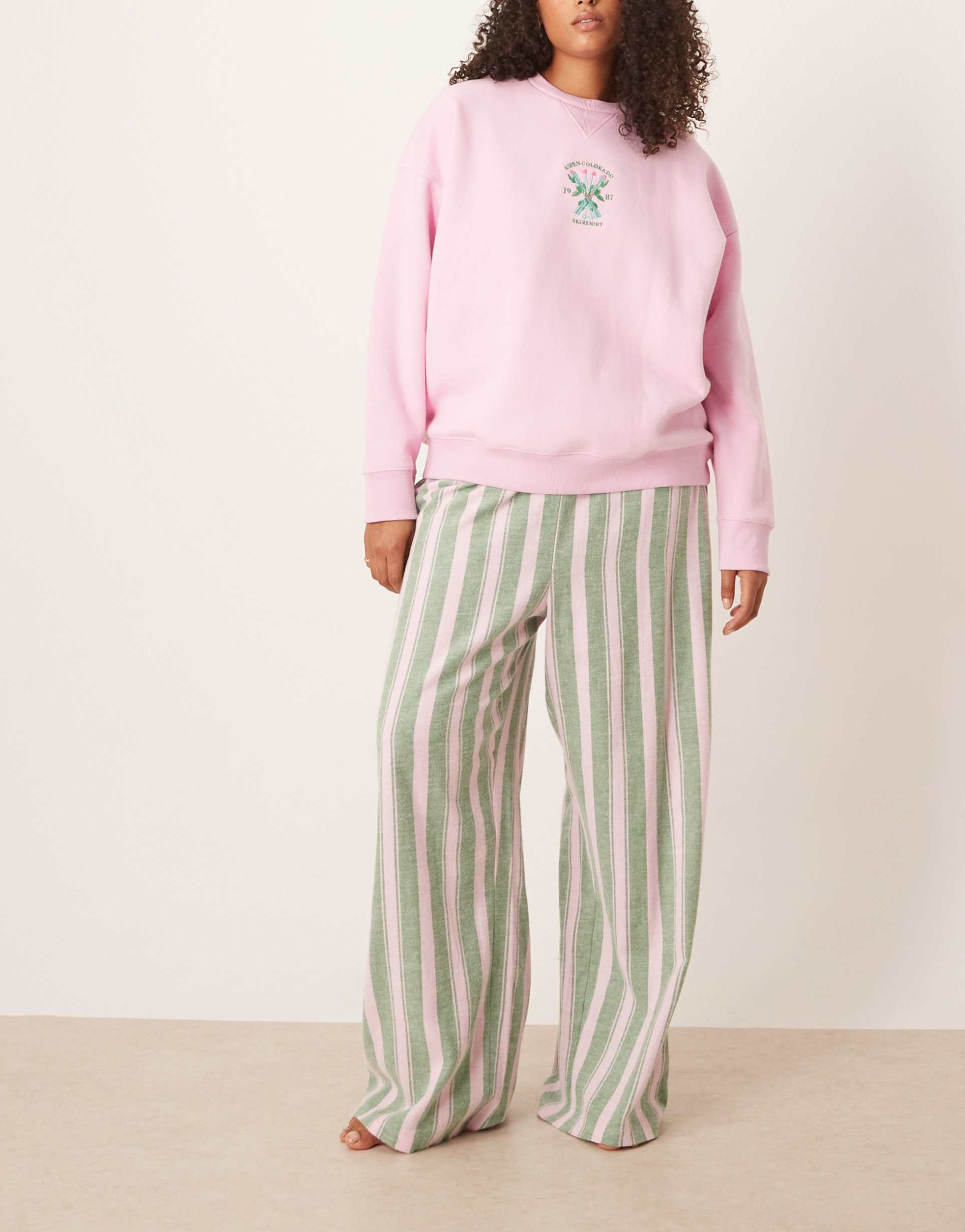 asos design curve logo jersey sweatshirt pajama set with woven pants in pink and green stripe