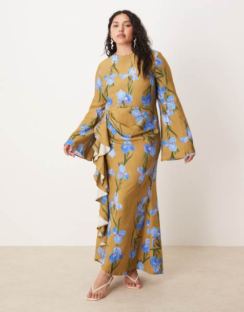 ASOS DESIGN Curve long sleeve maxi dress with ruffle skirt in oversized green floral print - view 1