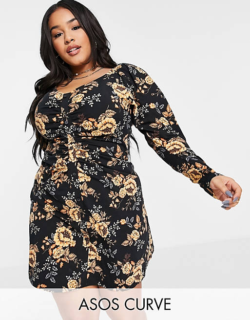 ASOS DESIGN Curve long sleeve mini dress with ruching detail in black and gold floral print