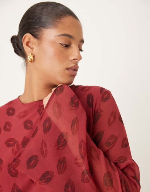 ASOS DESIGN Curve long sleeve mini dress with ruffle skirt in red lip print, 4 of 4